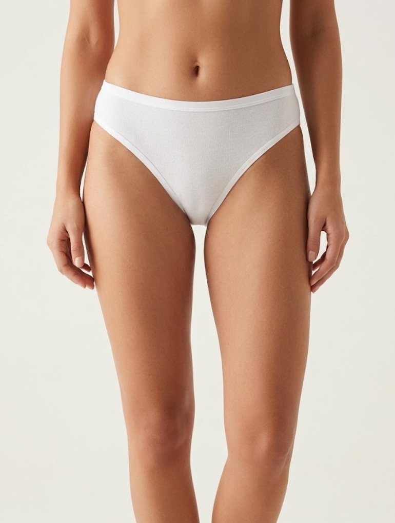 Model wearing a Sembol women's cotton brief in white